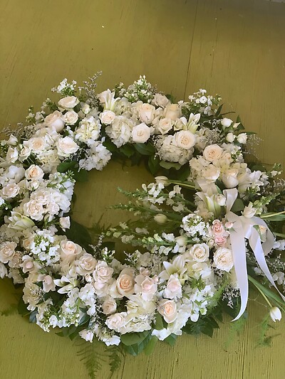 White wreath arranged by a florist in East Greenwich, RI : Busy Bee Florist